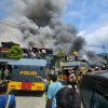 Polri Bantu Padamkan Kebakaran di Kodam Lama Jayapura